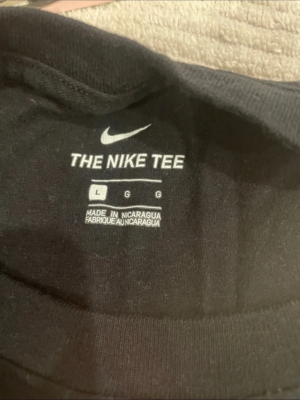 Nike Black Tee with Pink Swoosh and White Text